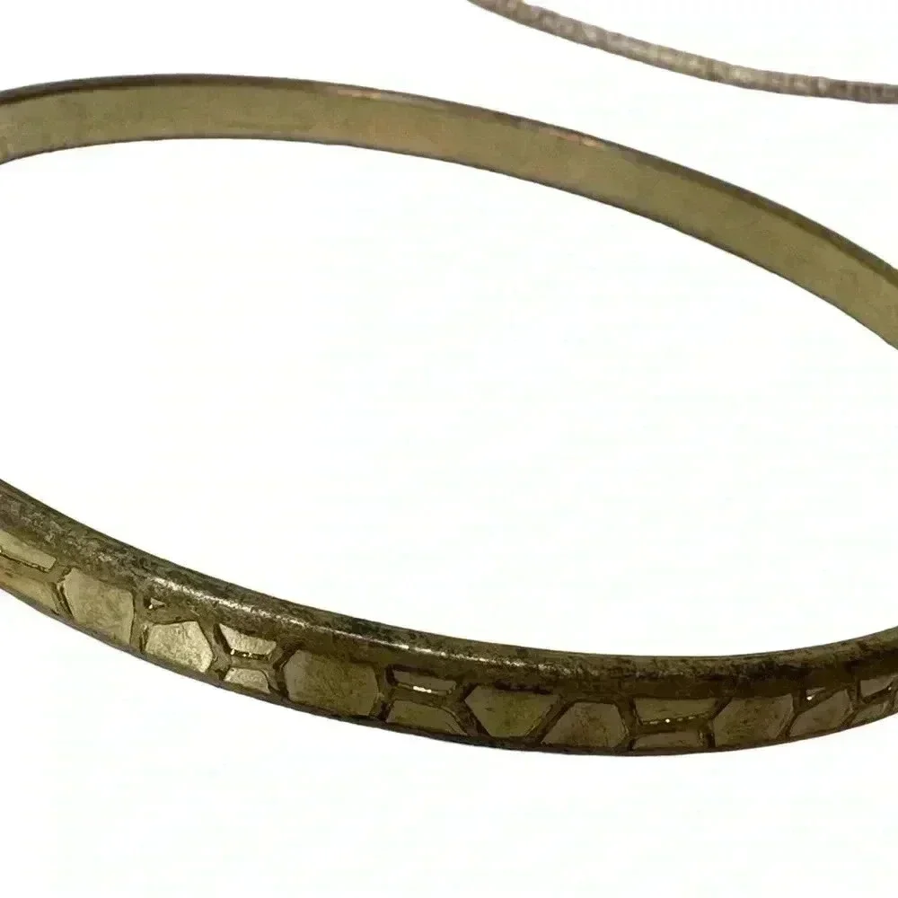 Multiple gold bangle bracelets random assortment of gold colored bracelets